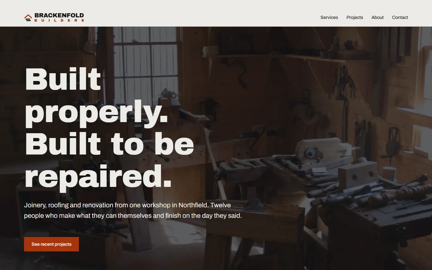 Start page of Brackenfold Builders: Built properly. Built to be repaired. over a photo of a joinery workshop